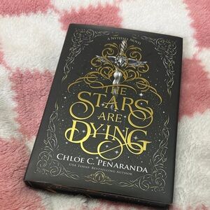 The Stars Are Dying Hardcover Book